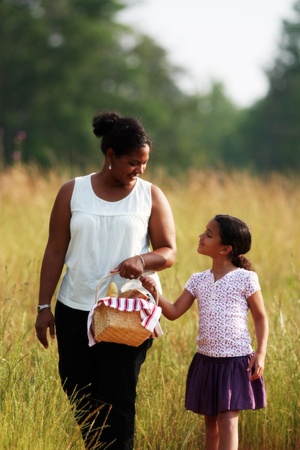 Mother and Daughter Having A Picnic Lunchの写真素材