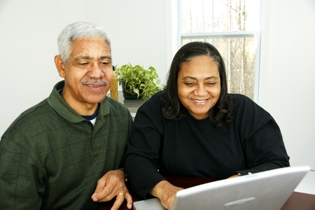 Family together inside their homeの写真素材