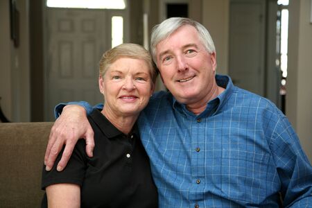 Senior couple together in their home