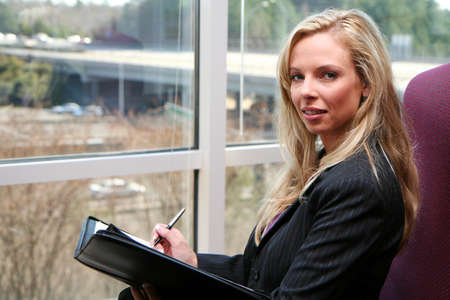 Young caucasian businesswoman ready for days work