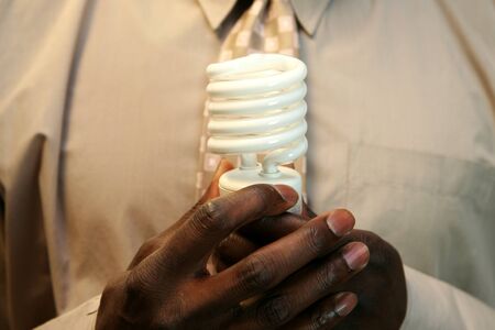 Man holding a lightbulb