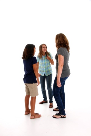 Teenage Girls Gathered on a White Backgroundの写真素材