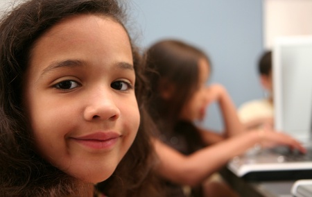 Children on computers at school