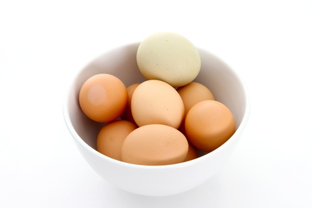 Bowl of Farm Fresh Eggs on White Backgroundの写真素材