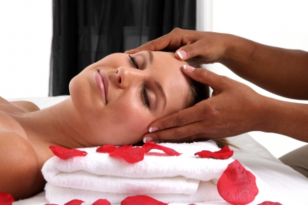 Woman getting a getting relaxing massage in salonの写真素材