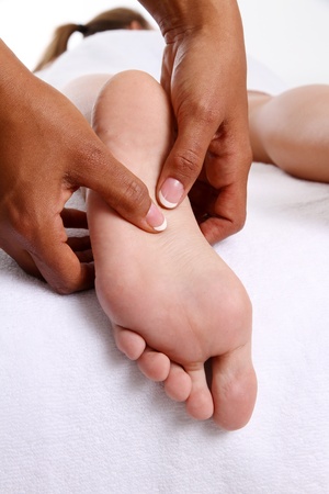 Woman getting a getting relaxing massage in salonの写真素材