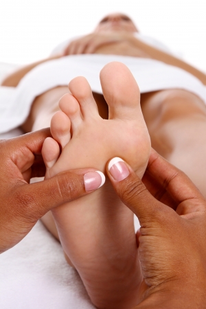 Woman getting a getting relaxing massage in salonの写真素材