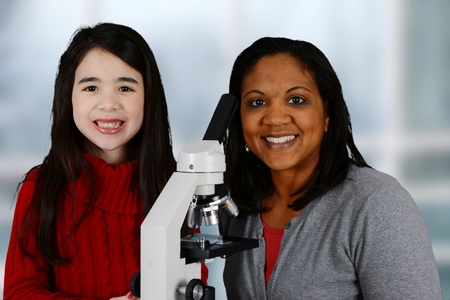 Girl in her classroom at school learningの写真素材