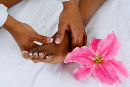 Woman getting a relaxing massage in salonの写真素材