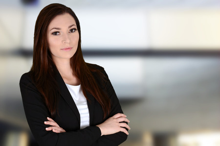 Business woman in her office at workの写真素材