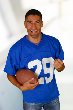 Football fan who is dressed in a jerseyの写真素材