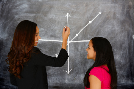 Teacher at school in the classroom ready for workの写真素材