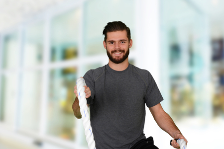Man working out while at the gymの写真素材