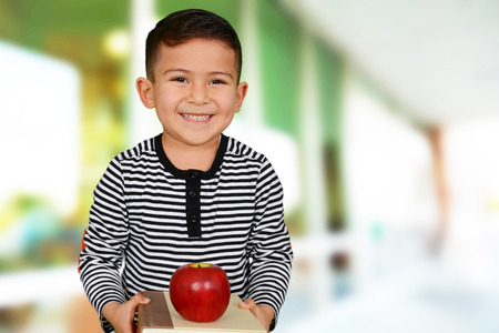 Young boy at school who is smilingの写真素材