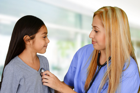 Young nurse working at her job in a hospitalの写真素材