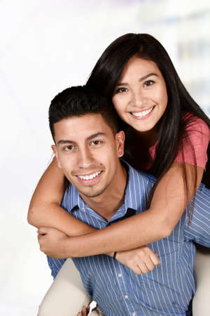 Happily married hispanic couple in love with each otherの写真素材