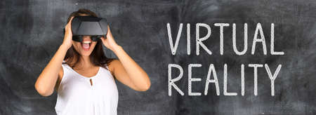 Virtual reality glasses being used by a happy woman