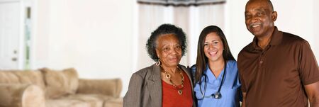Health care worker helping an elderly patient
