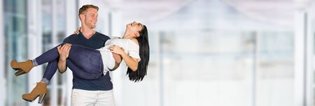 Family laying outside in the grass togetherの写真素材