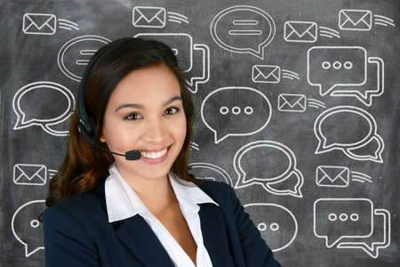 Businesswoman offering customer support services to clientsの写真素材