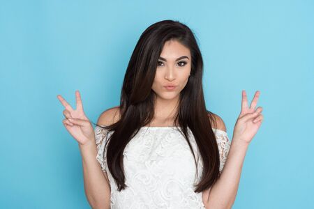 Happy young hispanic woman who is smilingの写真素材