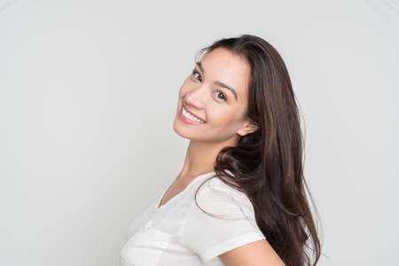 Portrait of a smiling happy young woman