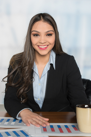 A woman who is working at a place of businessの写真素材