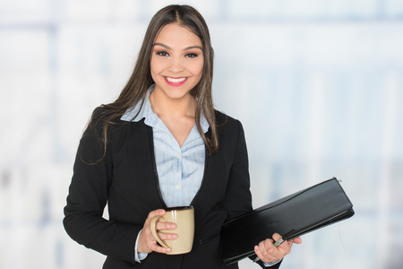 A woman who is working at a place of businessの写真素材