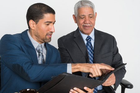 Man working with a customer on financial planningの写真素材