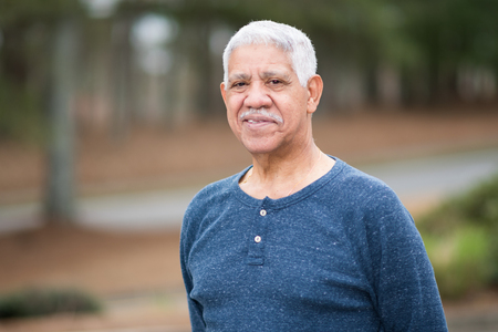 Elderly hispanic senior citizen man in a portraitの写真素材