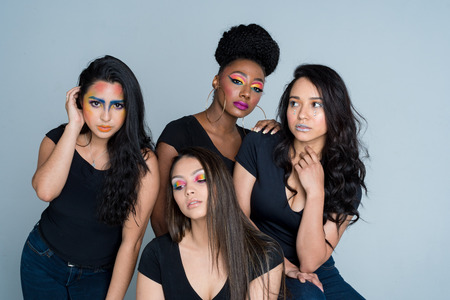 A group of fashion models posing at a photo shootの写真素材