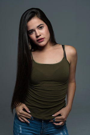 Hispanic teen girl modeling in a portrait sessionの写真素材