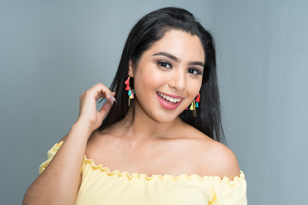 Hispanic teen girl modeling in a portrait session