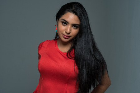 Hispanic teen girl modeling in a portrait session