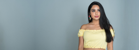 Hispanic teen girl modeling in a portrait sessionの写真素材