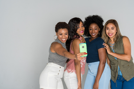 Group of young female friends spending time togetherの写真素材