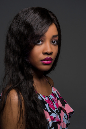 Portrait of a young beautiful african american womanの写真素材