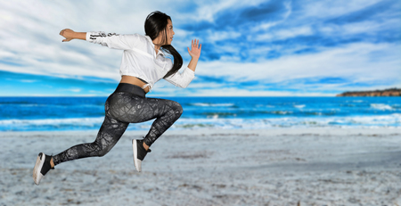 A young female athlete working out in training