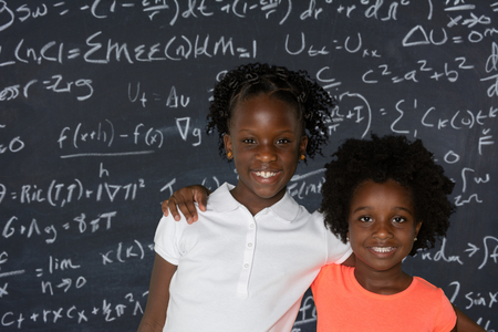 Group of two young african american girls who are sistersの写真素材