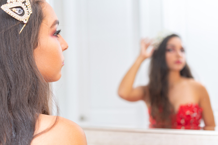 Teenage girl who is competing at a beauty pageantの写真素材