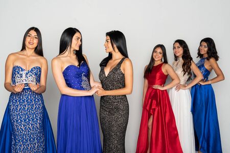 A group of teenage girls competing in a beauty pageantの写真素材