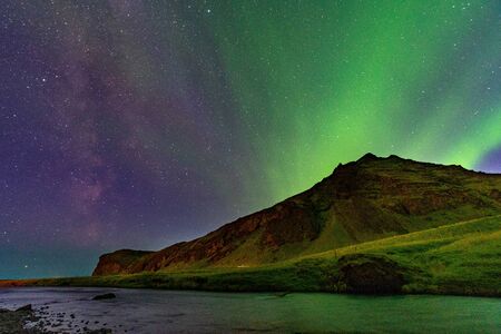 Northern Lights Aurora In Iceland along with the Milky Wayの写真素材