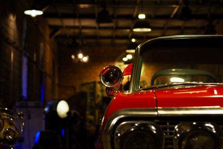 Old garage with a red antique carの写真素材