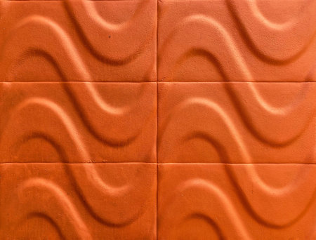 Orange brick wall texture. Abstract background for design with copy space.の写真素材