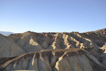 Hiking in the Death Valley at sunsetの写真素材