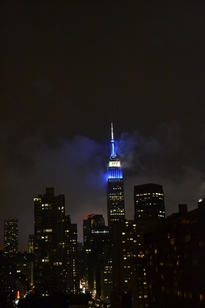 The Empire State Building in NYC at night from the East River sideの写真素材