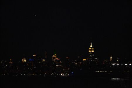 Picture taken from a Ferry in the Hudson river at nightの写真素材