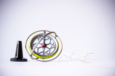 Gyroscope composed of a free rotating wheel and a spinning axis, uses Earths gravity to determine orientationの写真素材