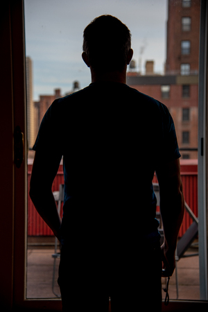 Silhouette of a man in the upper east side in NYCの写真素材