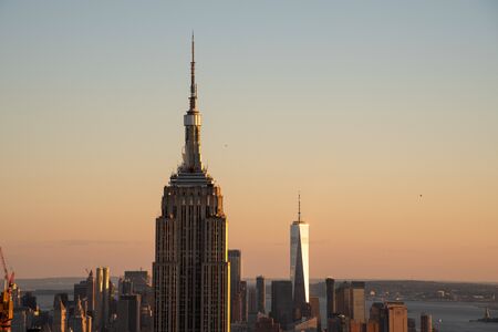 NYCs lower Manhattan with the Empire State Building from a high up point in Midtown